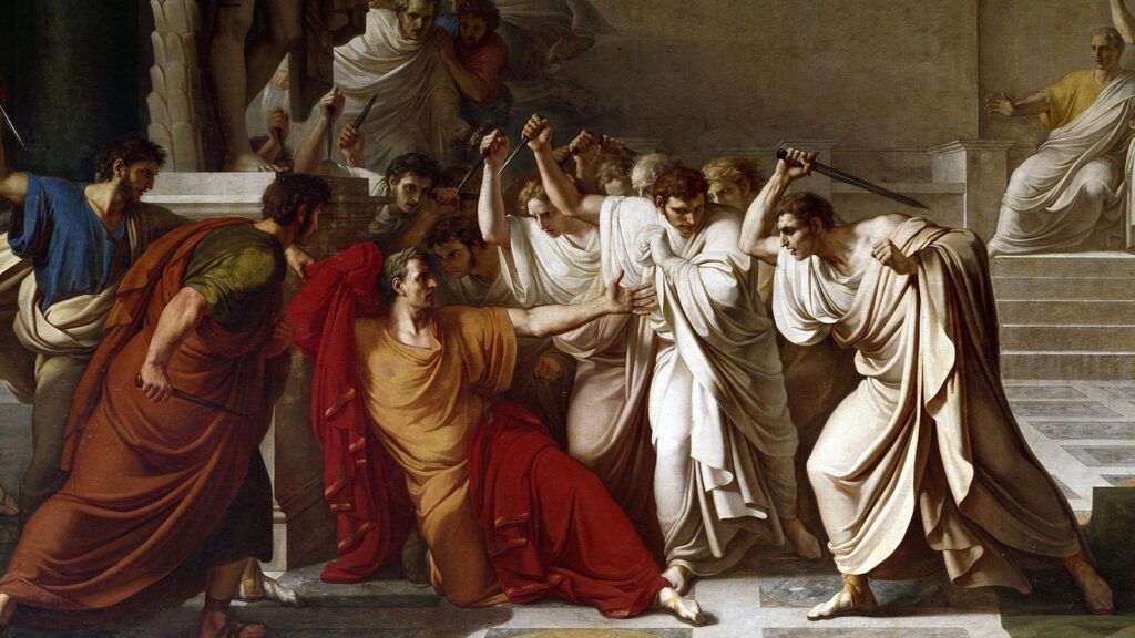 Julius Caesar being stabbed by the conspirators.